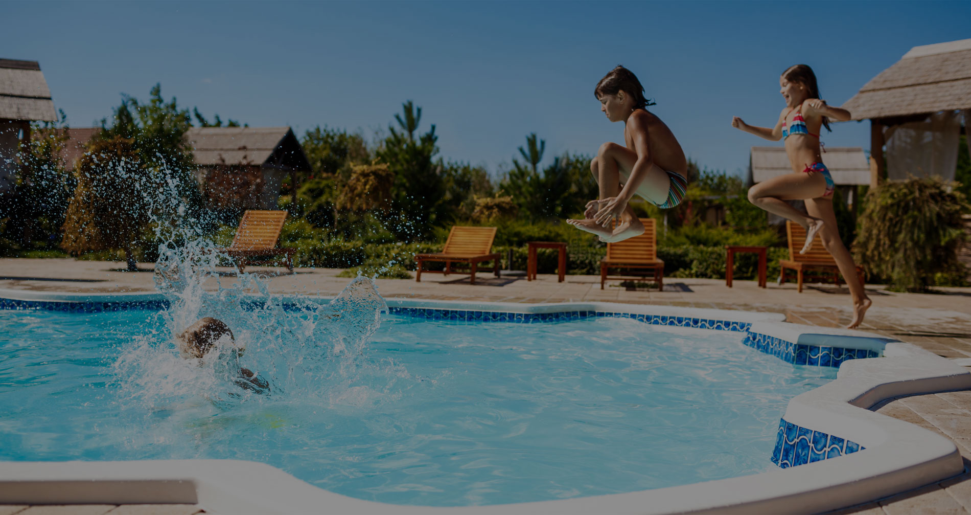 Kids jumping into a swimming pool in Lehigh Acres Pool Cleaning Service